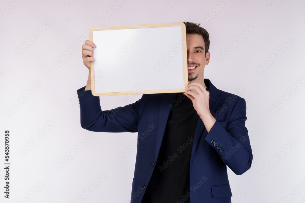 Portrait of happy businessman showing blank signboard on isolated white background Portrait of happy businessman showing blank signboard on isolated white background