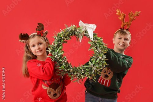 Little children in reindeer...