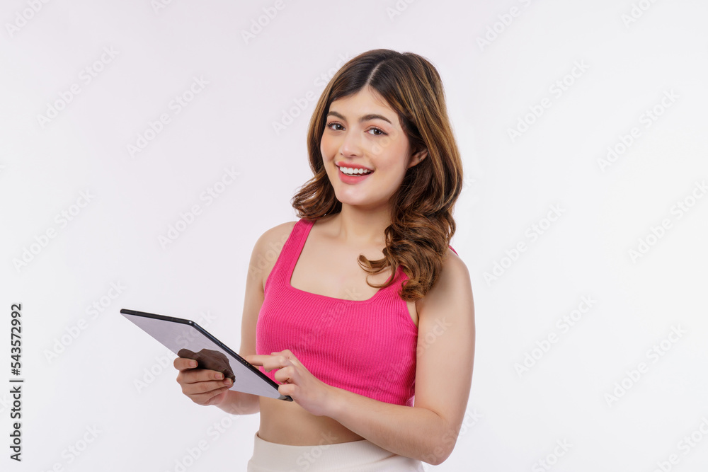 Portrait of excited young woman holding tablet isolated over white background Portrait of excited young woman holding tablet isolated over white background