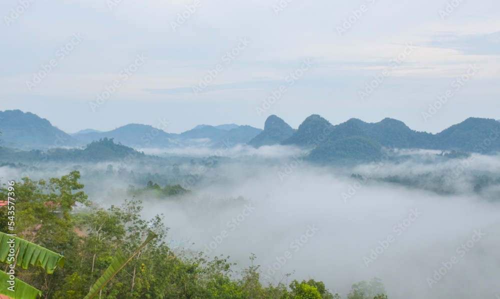 Morning mist and beautiful mountains in southern Thailand.