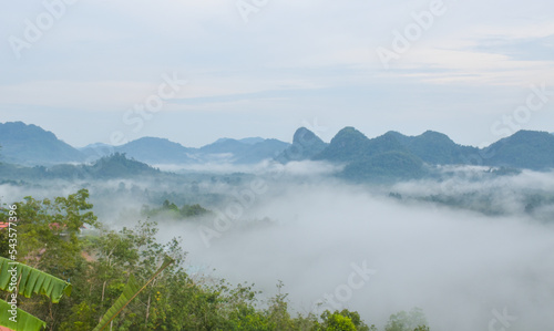 Morning mist and beautiful mountains in southern Thailand.