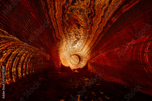 Red and orange patterns on ceiling of sylvinite salt quarry photo