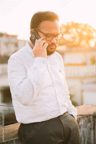 Middle age beard Indian Man posing for the camera