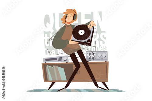 Guy listening vinyl records, music collection