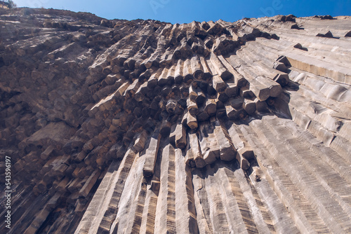 Basalt columns in Armenia. Symphony of Stones tourist attraction in Garni of rocky canyon perfect shaped geological basalt formations.