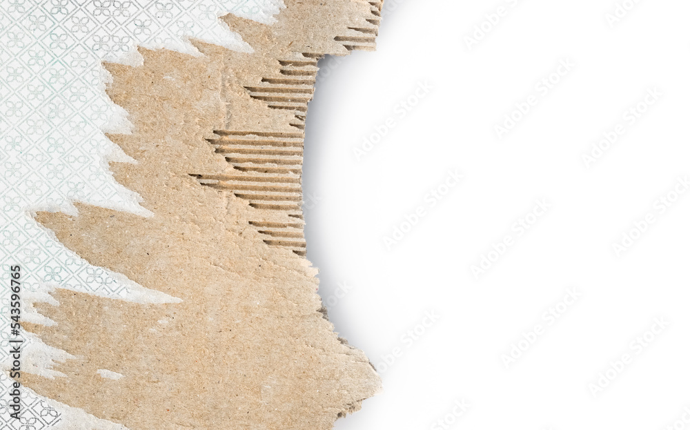 A scrap of cardboard paper on white background with copy space A scrap of cardboard paper on white background with copy space