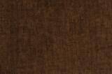 Texture of fabric for furniture of rich brown color. noisy structure