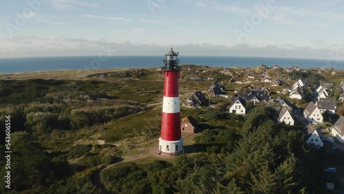Lighthouse Hörnum, Sylt, Germany. Schleswig-Holstein, North Sea. 4K drone. Beautiful tourist destination and attraction from above.