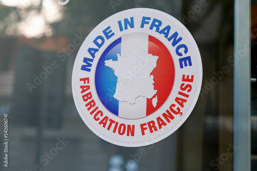 made in france text sign store means french fabrication francaise on windows stickers facade shop photo
