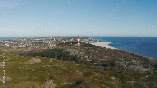Lighthouse Hörnum, Sylt, Germany. Schleswig-Holstein, North Sea. 4K drone. Beautiful tourist destination and attraction from above.