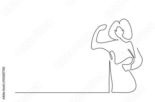 successful strong woman showing biceps