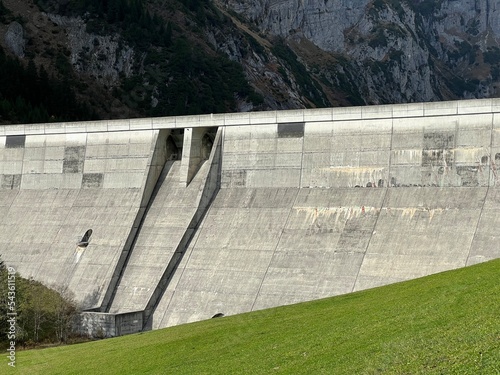 The dam Panixer or concrete dam on the reservoir lake Panixersee (Lag da Pigniu) on the slopes of the Glarus Alps mountain massif, Pigniu-Panix - Canton of Grisons, Switzerland (Schweiz) photo