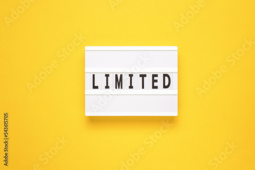 Lightbox with word limited on yellow background