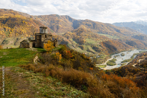 Central Church of Zelenchuksky Churches under heavy sky around the ruins of Nizhnearkhyzskoe gorodishche near Arkhyz, Cherkessia, Russian Federation
 photo
