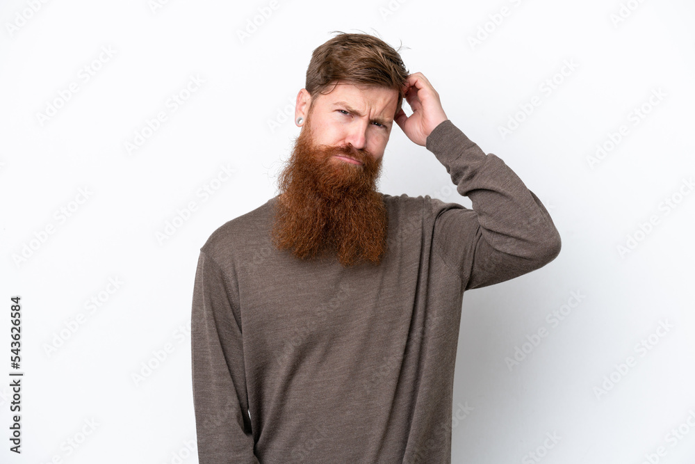 Redhead man with beard isolated on white background having doubts Redhead man with beard isolated on white background having doubts