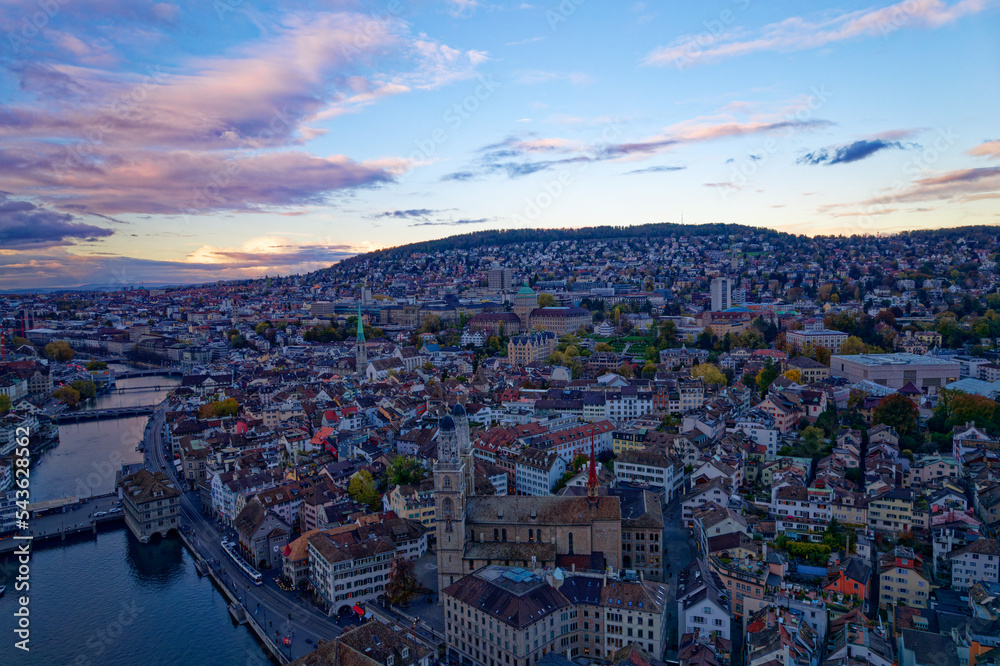Fototapeta premium Aerial view of City of Zürich with the old town and Limmat River on a cloudy autumn day. Photo taken November 4th, 2022, Zurich, Switzerland.