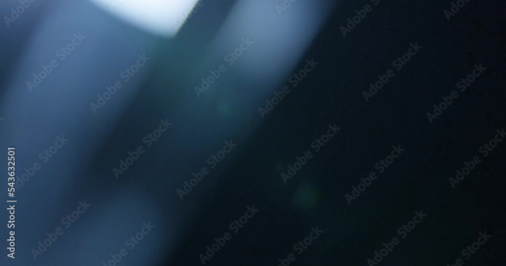 Elegant lens flare Light Leak overlay on black background. Spherical Optical Prism Light abstract background 4K