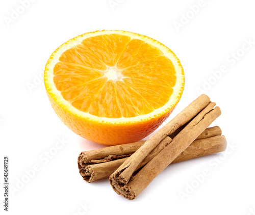 Orange with cinnamon isolated on white background. Half an orange with spice.