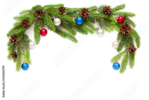 Christmas frame made of Christmas tree branches, Christmas toys and pine cones on a white background with isolated copy space  © Olena Svechkova