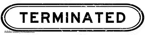 Grunge black terminated word rubber seal stamp on white background