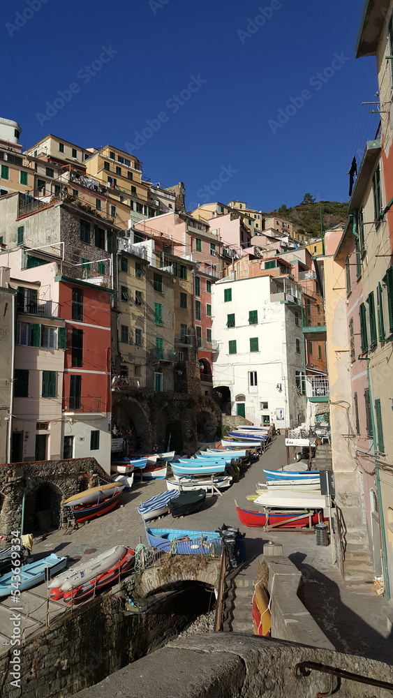 Cinque Terre, Italy. There are colorful and somewhat identical but different buildings.