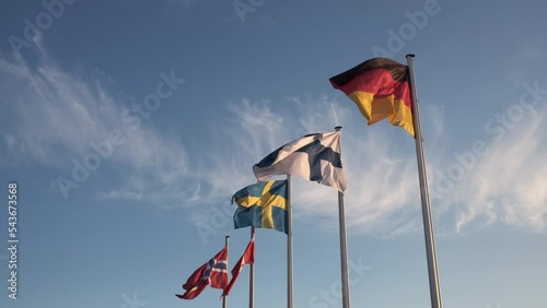 Flags of Germany and the the nordic countries Sweden, Finland, Denmark and Norway in the wind photo