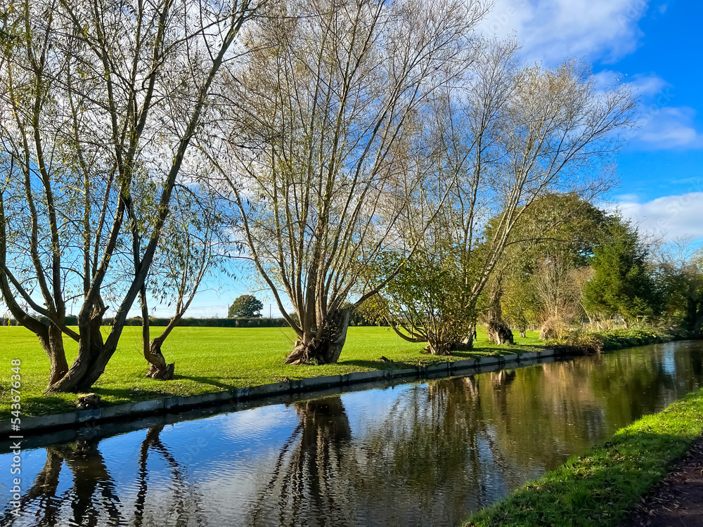 View of the canal and fields behind. Selective focus View of the canal and fields behind. Selective focus