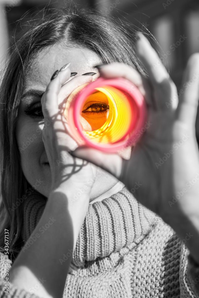 Abstract image of a girl on a black and white background with color of vision (vision restoration, optimism, ending depression - concept)