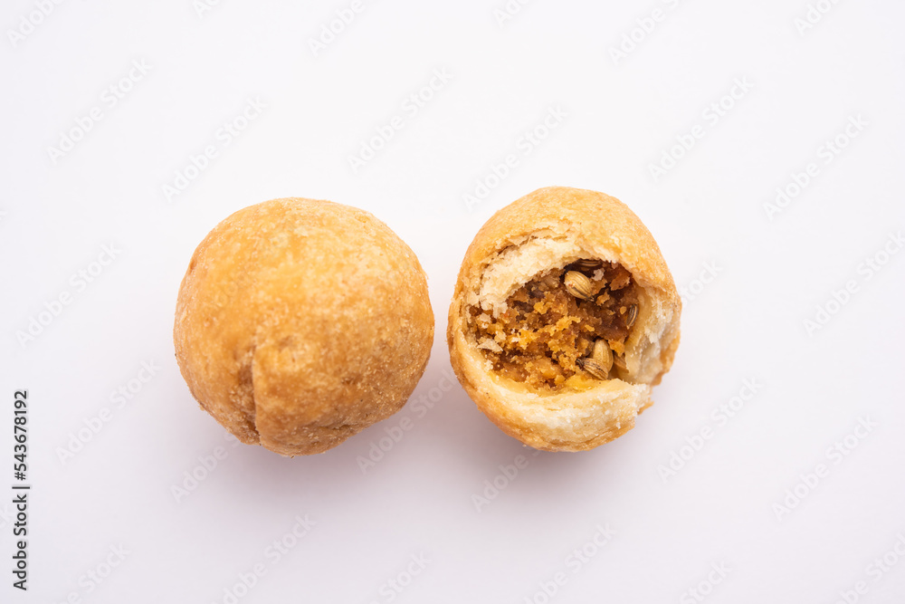 Dry kachori is a dry fruits stuffed ball shaped farsan also called kachauri, kachodi and katchuri - obrazy, fototapety, plakaty 