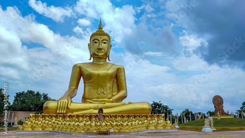 The big gold Seated Buddha statue.
