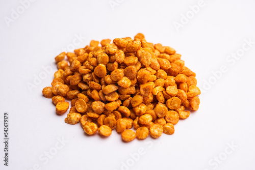 Fried and Spicy Chana Dal Masala namkeen is a popular Chakna recipe. served in a bowl photo