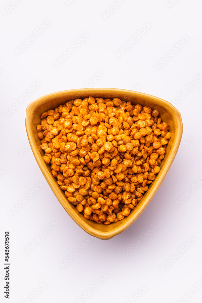 Fried and Spicy Chana Dal Masala namkeen is a popular Chakna recipe. served in a bowl Fried and Spicy Chana Dal Masala namkeen is a popular Chakna recipe. served in a bowl