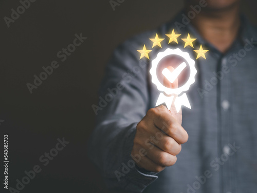 Person thumbs up best score performance or efficiency in good quality management, ISO certificate standardize, assurance and guarantee for excellent service concept. Standard control for business.