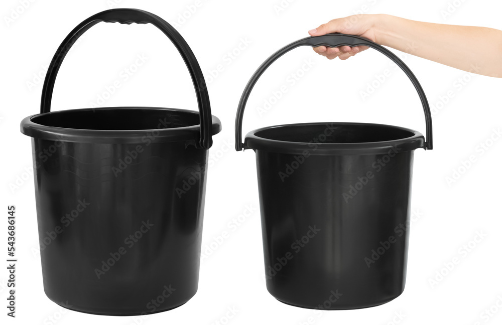 Black plastic bucket in hand. Isolated from the background Black plastic bucket in hand. Isolated from the background