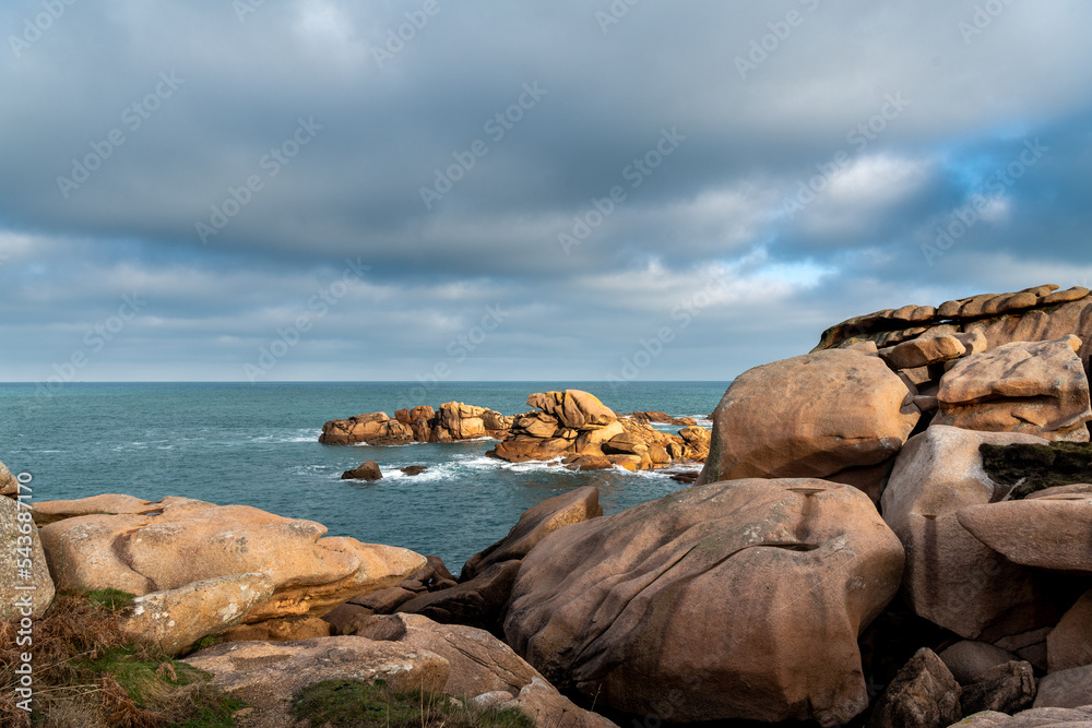 France, Ploumenach, 2022-01-13. Rock formation along the pink granite coast in Brittany. 