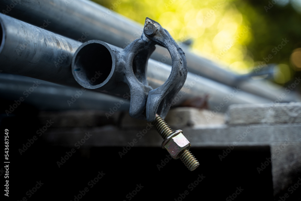Construction site. Workers. House renovation with tools. New house with new materials, stairs, sheets and house coat. Steel and iron. Tubes Construction site. Workers. House renovation with tools. New house with new materials, stairs, sheets and house coat. Steel and iron. Tubes
