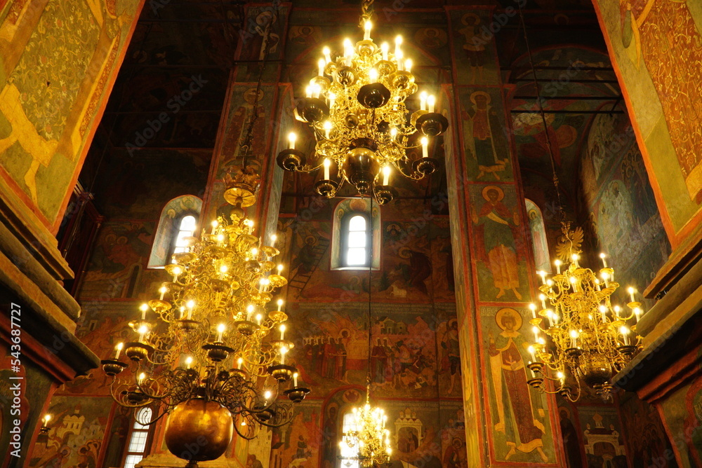 Beautiful ornate painted interior of Orthodox Church. Old frescoes with icons inside luxury Russian cathedral. Moscow Beautiful ornate painted interior of Orthodox Church. Old frescoes with icons inside luxury Russian cathedral. Moscow