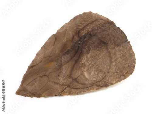 Stone Age Hand Axe out of Flintstone on white Background photo