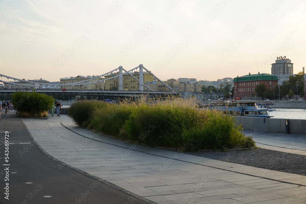 Tourists walk in the Muzeon Park in Moscow, people ride, run and walk along the Crimean embankment in the summer