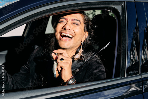 Young person driving a car