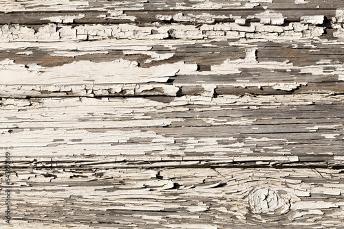 Wooden wall with old white paint