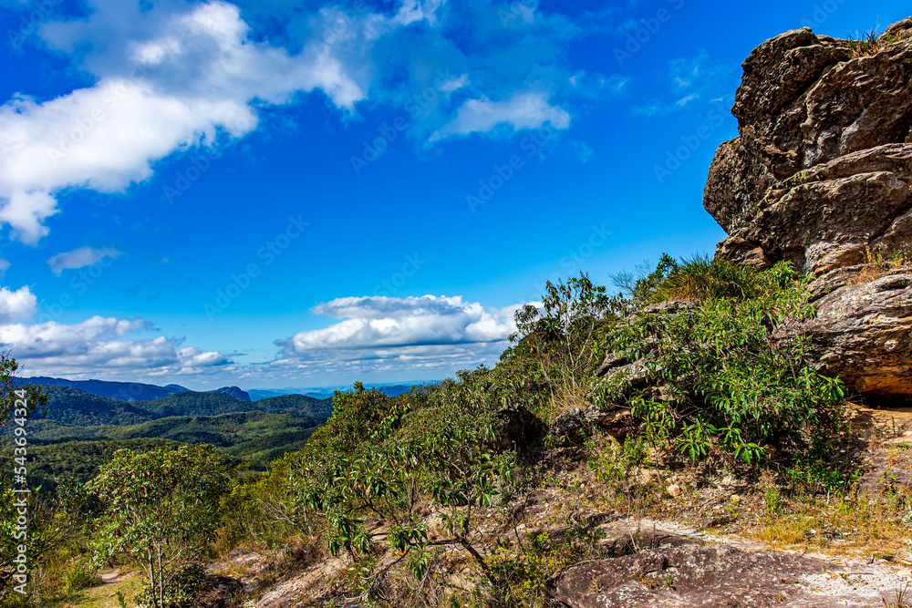 Beautiful image of the mountain range with their rocks and vegetation and typical forests of the state of Minas Gerais in Brazil on a sunny day