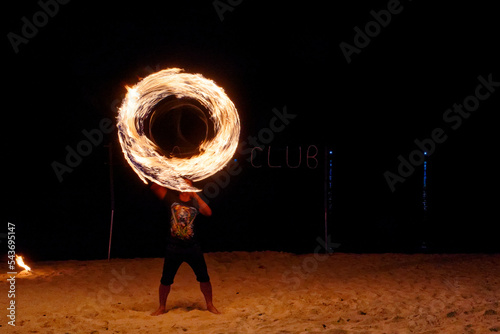 Fireshow at beach in Koh Phangan, Thailand photo