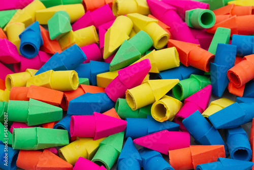 Bright colored pencil erasers background photo