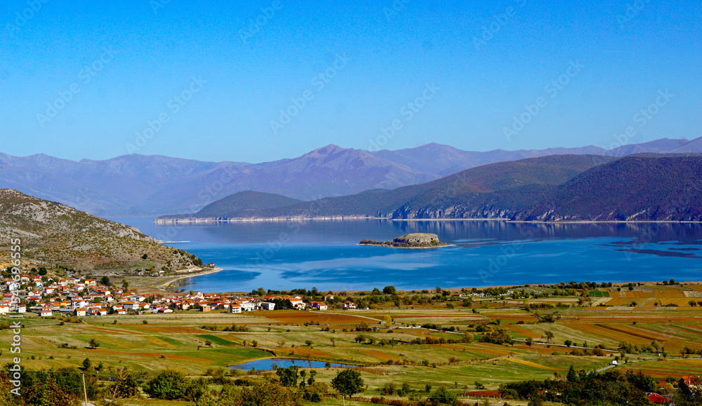 picture of a lake Prespa in Albania and island Maligrad in autumn