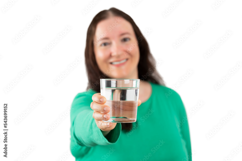Beautiful woman smiling while holding a glass of water with white background. Lifestyle concept. Beautiful woman smiling while holding a glass of water with white background. Lifestyle concept.