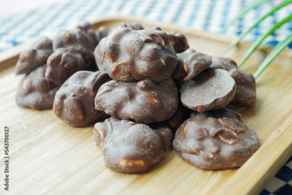 close up of peanut chocolate candy on table close up of peanut chocolate candy on table