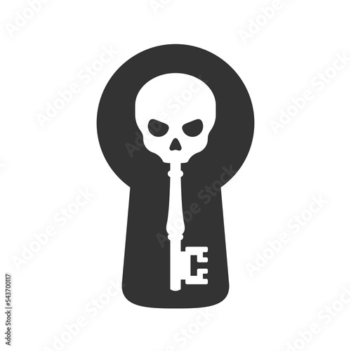 Old antique key with a skull in a keyhole