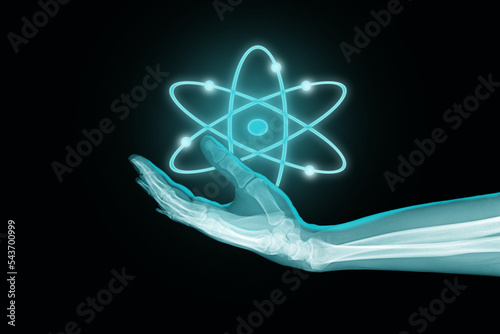 Nuclear power symbol in a woman's hand