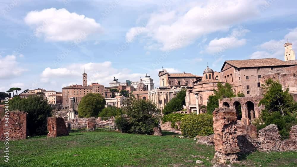 The Roman Forum and the remains of ancient Rome. Italy. 4K. The ruins of ancient Rome, the Roman Forum, the Colosseum. Aerial shooting with drone in 4K. Colosseo